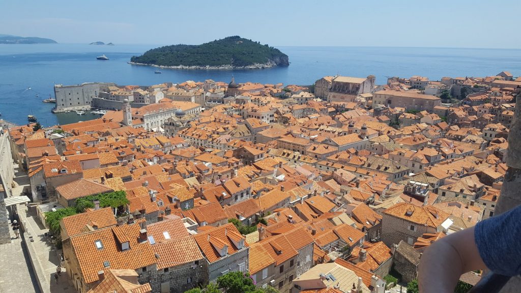 A view over dubrovnik's terracotta rooftops and looking out to sea